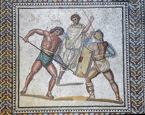 An ancient Roman mosaic depicting two gladiators in battle. 