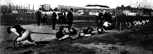 An Olympic tug of war match at the 1904 Olympics in St. Louis, Missouri. 
