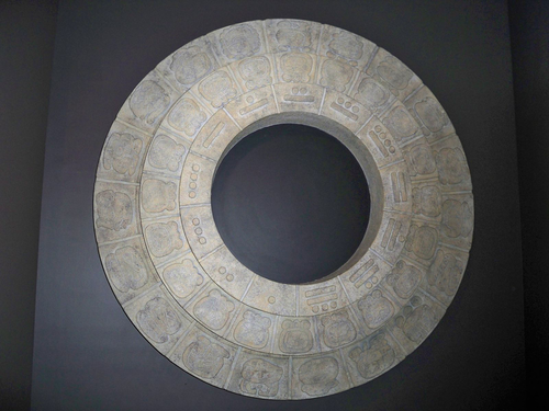 A stone version of a Mayan calendar. 